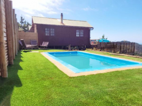 Cabaña Punta Del Cerro, con Piscina, Tinaja caliente y vista al Mar